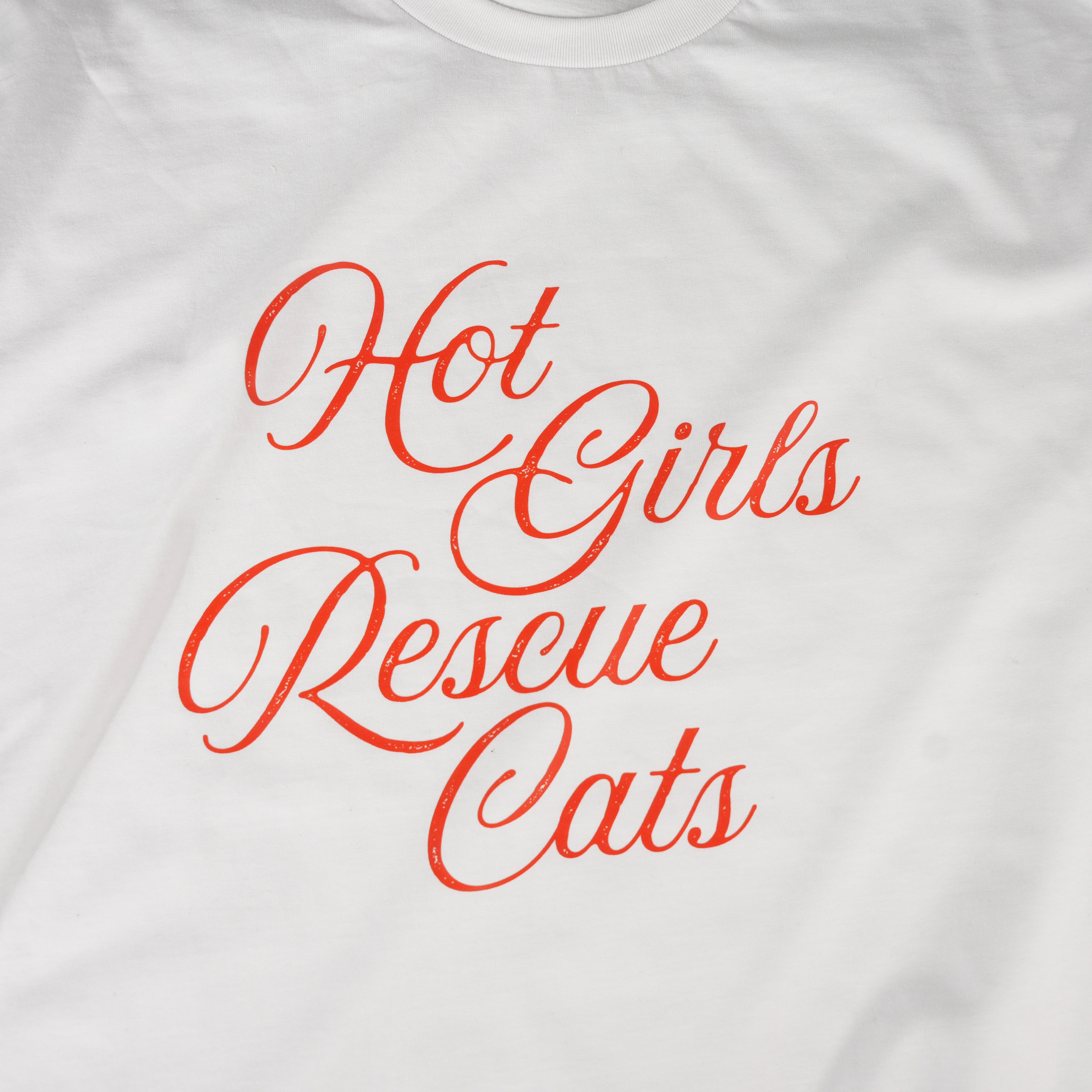 White t-shirt with red text 'Hot Girls Rescue Cats' on a white background