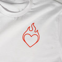 White t-shirt with a red heart and flame design on a white background
